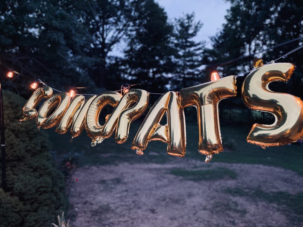 Graduation party planning guide - Congratulations balloons on a string